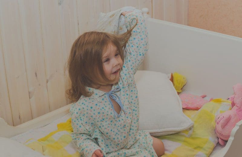 kind naar bed